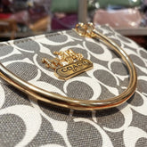 Elegant Grey Monogram Handbag with Gold Handle