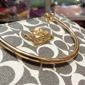 Elegant Grey Monogram Handbag with Gold Handle