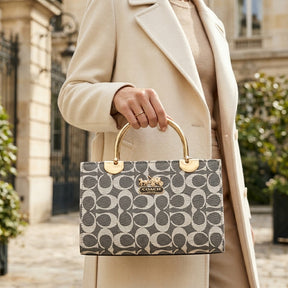 Elegant Grey Monogram Handbag with Gold Handle